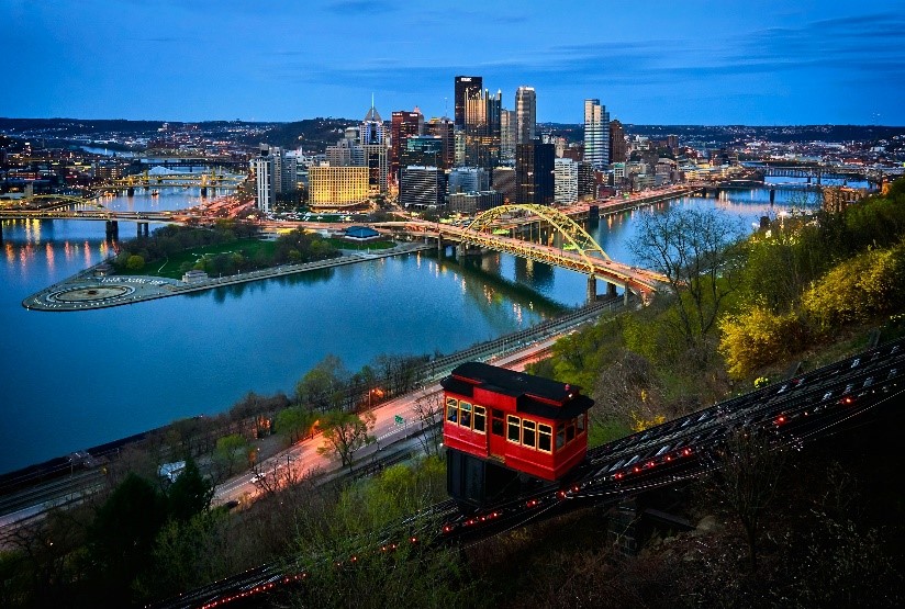 View of Pittsburgh at dusk with an incline in the foreground